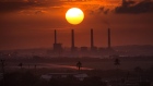 The sun sets over an oil refinery in Puerto Cabello, Venezuela.