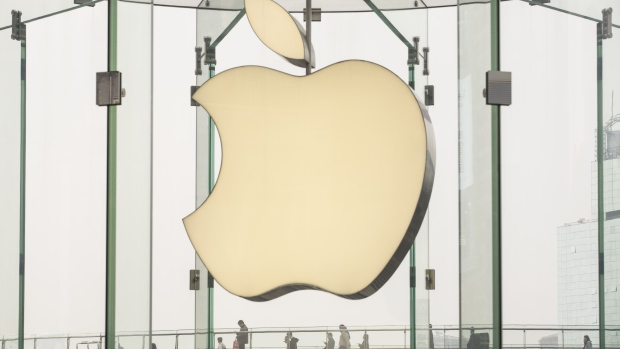 Signage for an Apple Inc. store at the Shanghai International Center (IFC) shopping mall in Shanghai, China, on Tuesday, Nov. 27, 2018. Apple, which has lost a fifth of its value in a tech market rout since October, is poised for another setback after U.S. President Donald Trump suggested that 10 percent tariffs could be placed on mobile phones, like the iPhone, and laptops made in China. Photographer: Qilai Shen/Bloomberg