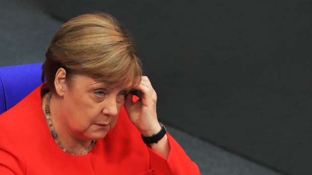 Angela Merkel, Germany's chancellor, reacts in the Bundestag in Berlin, Germany, on Thursday, June 18, 2020. 