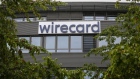 A sign hangs outside the Wirecard AG headquarters in the Aschheim district of Munich, Germany, on Friday, June 19, 2020. Wirecard shares continued their free-fall after the two Asian banks that were supposed to be holding 1.9 billion euros ($2.1 billion) of missing cash denied any business relationship with the German payments company. Photographer: Michaela Handrek-Rehle/Bloomberg
