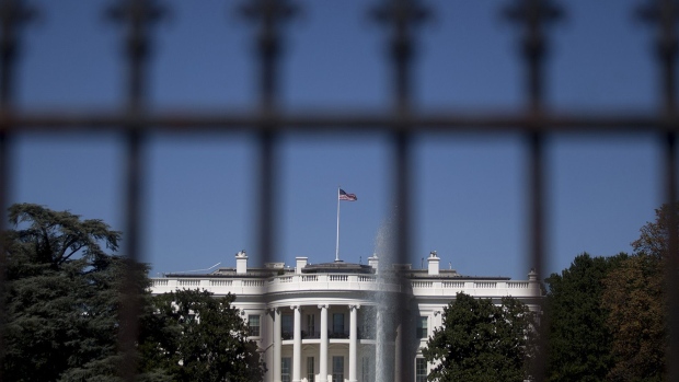 The south side of the White House stands past a fence in Washington, D.C.