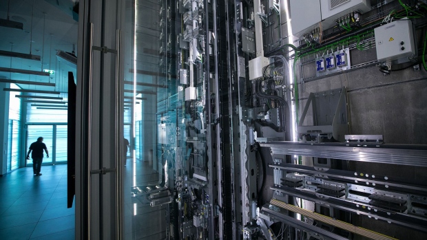 A Multi system motor technology mechanism, which enables vertical and horizontal elevator movement, sits inside the Thyssenkrupp Elevator AG test tower in Rottweill, Germany. Photographer: Krisztian Bocsi/Bloomberg