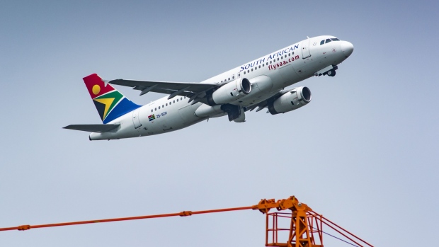 An Airbus A320-200 passenger jet, operated by South African Airlines (SAA), takes off from O.R. Tambo International Airport in Johannesburg, South Africa, on Friday, Jan. 24, 2020. South African Airways said “time is of the essence” for the government to provide a pledged cash injection if the loss-making national carrier is to continue flying.
