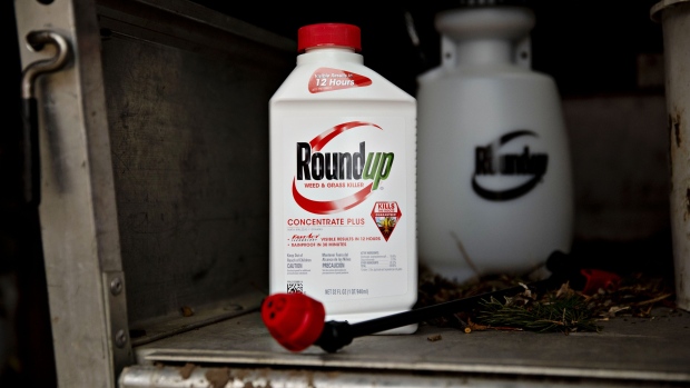 A bottle of Bayer AG Roundup brand weedkiller concentrate is arranged for a photograph in a garden shed in Princeton, Illinois, U.S., on Thursday, March 28, 2019. Bayer vowed to keep defending its weedkiller Roundup after losing a second trial over claims it causes cancer, indicating that the embattled company isn't yet ready to consider spending billions of dollars to settle thousands of similar lawsuits.