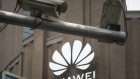 Public surveillance cameras are mounted to a pole in front of Huawei Technologies Co.'s new flagship store in Shanghai, China, on Wednesday, June 24, 2020. The store is Huawei's largest in the world, with a business area of nearly 5000 square meters, according to the company.