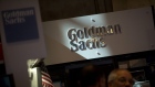 The Goldman Sachs & Co. logo is displayed at the company's booth on the floor of the New York Stock Exchange. Photographer: Scott Eells/Bloomberg