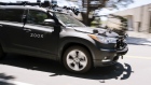 A Zoox Inc. self-driving car is operated outside the company's headquarters in Foster City, California, U.S., on Wednesday May 27, 2020. Amazon.com Inc.’s talks to buy driverless vehicle startup Zoox Inc. has analysts speculating the deal could save the e-commerce giant tens of billions a year and put auto, parcel and ride-hailing companies on their heels.