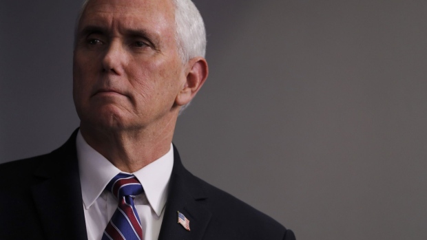U.S. Vice President Mike Pence listens during a news conference at the White House in Washington D.C., U.S. on Monday, April 20, 2020.