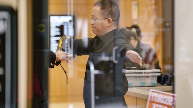 Hao Zhang, a professor at Tianjin University in China, goes through security while arriving at federal court in San Jose, California, U.S., on Wednesday, Oct. 2, 2019. Zhang is a professor-spy who conspired with a colleague from the University of Southern California to steal and sell American secrets to the Chinese government and military through a shell company in the Cayman Islands.