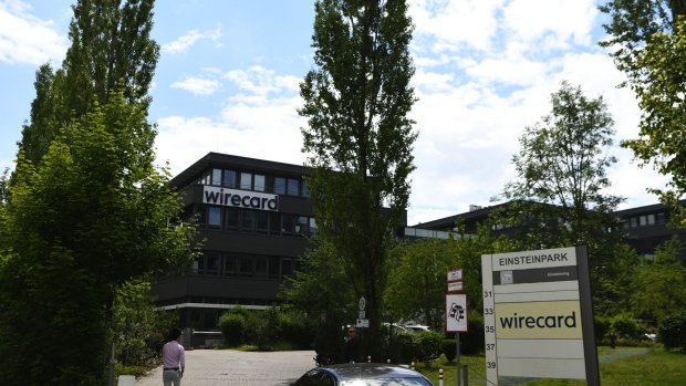 A visitor arrives at the Wirecard AG headquarters in Munich, Germany, on Thursday, June 25, 2020. Wirecard filed for insolvency, following the arrest of its CEO amid a massive accounting scandal that left the German payment-processing firm scrambling to find over $2 billion dollars missing from its balance sheet. Photographer: Andreas Gebert/Bloomberg