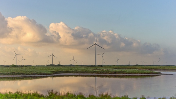 Wind turbines stand at the Avangrid Renewables' Baffin Wind Power Project in Sarita, Texas, U.S., on Wednesday, June 14, 2017. In the cut-throat Texas energy market, the construction of coastal wind turbines—some 900 in all—has had a profound impact. It's been terrific for consumers, helping further drive down electricity bills, but horrible for natural gas-fired generators. Photographer: Eddie Seal/Bloomberg