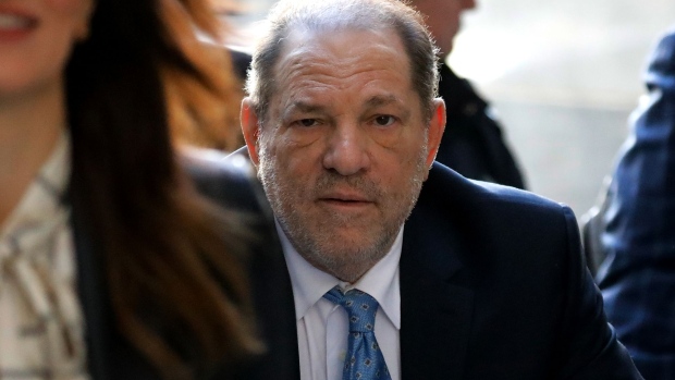 Harvey Weinstein, former co-chairman of the Weinstein Co., center, arrives at state supreme court in New York, U.S., on Monday, Feb. 24, 2020. Jurors at Weinstein's trial are set to resume deliberations Monday after signaling they are at odds on the top charges, AP reports.