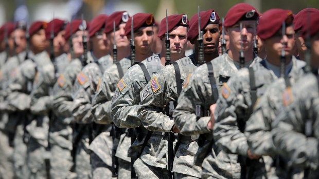 Troops from the 82nd Airborne division march at Fort Bragg, North Carolina. Photographer: JEFFREY A. CAMARATI/BLOOMBERG NEWS