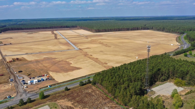 A plot of cleared forest land sits near a pine forest during ground laying work for the Tesla Inc. Gigafactory in this aerial photograph in Gruenheide, Germany, on Thursday, May 7, 2020. Tesla’s first European car plant planned for near Berlin is making progress despite minor setbacks related to the coronavirus disruptions. Photographer: Alex Kraus/Bloomberg