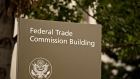Signage stands outside the U.S. Federal Trade Commission (FTC) headquarters in Washington, D.C., U.S. Photographer: Andrew Harrer/Bloomberg