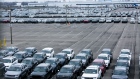 New vehicles sit parked outside the idled Fiat Chrysler Automobiles NV (FCA) Jefferson North Plant in Detroit, Michigan, U.S., on Monday, March 23, 2020. The auto industry is escalating its push for U.S. assistance to help weather the impact of a global pandemic that has halted or will soon stop production at 42 out of 44 plants that assemble vehicles in the country.