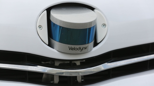 A Velodyne Lidar puck sensor sits in the bonnet of a self-driving car. Photographer: Andrey Rudakov/Bloomberg