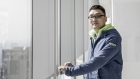 Colin Huang, chief executive officer and founder of Pinduoduo, poses for a photograph at the company's office in Shanghai, China, on Friday, Feb. 24, 2017. Pinduoduo, or PDD, is a kind of Facebook-Groupon mashup that Huang believes could revolutionize e-commerce.