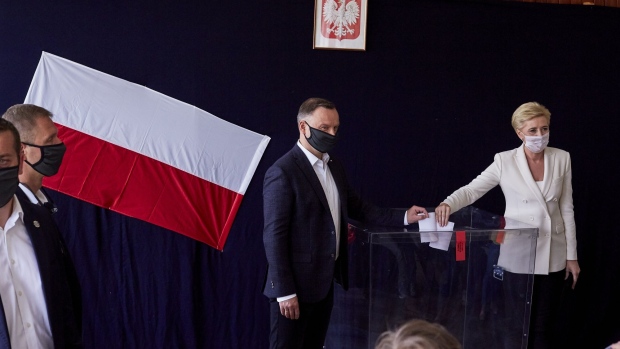 Andrzej Duda votes in the prediential election first round in Krakow, on June 28. Photographer: Bartek Sadowski/Bloomberg