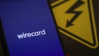 The Wirecard AG payment app launch screen is displayed on an Apple Inc. iPhone X smartphone in this arranged photograph in Frankfurt, Germany, on Tuesday, June 30, 2020. Singapore’s financial regulators are working with local police to scrutinize aspects of the case surrounding Wirecard AG, the scandal-ridden German payments company.