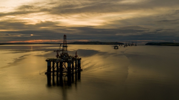 Mobile offshore drilling units stand in the Port of Cromarty Firth in this aerial view in Cromarty, U.K., on Tuesday, June 23, 2020. Oil headed for a weekly decline -- only the second since April -- as a surge in U.S. coronavirus cases clouded the demand outlook, though the pessimism was tempered by huge cuts to Russia's seaborne crude exports. Photographer: Jason Alden/Bloomberg