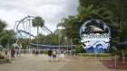 Visitors enter the SeaWorld amusement park in Orlando, Florida on June 11. Photographer: Zack Wittman/Bloomberg