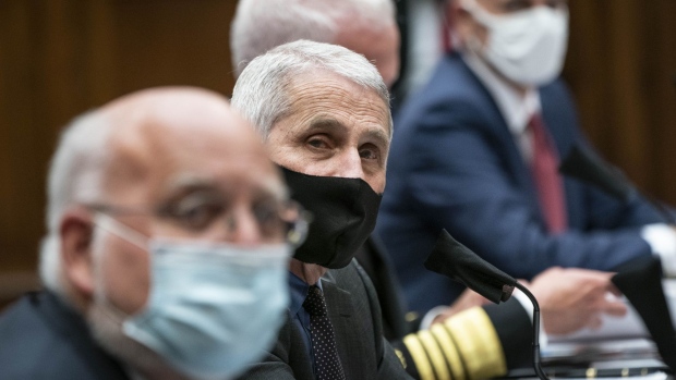Anthony Fauci, center, at a House Energy and Commerce Committee hearing. Photographer: Sarah Silbiger/Bloomberg