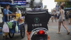 An UberEats, operated by Uber Technologies Inc., branded box sits on a motor scooter in London, U.K., on Thursday, Dec. 22, 2016. The food delivery business model has proven attractive to venture capitalists, who last year poured $5.5 billion into food-delivery companies globally, according to research firm CB Insights.