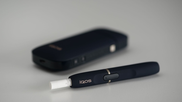 The Philip Morris International Inc. iQOS electronic cigarette is arranged for a photograph in Tokyo, Japan.