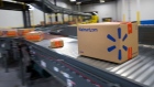 Packages move along a conveyor belt inside a Walmart fulfillment center in Bethlehem, Pennsylvania.