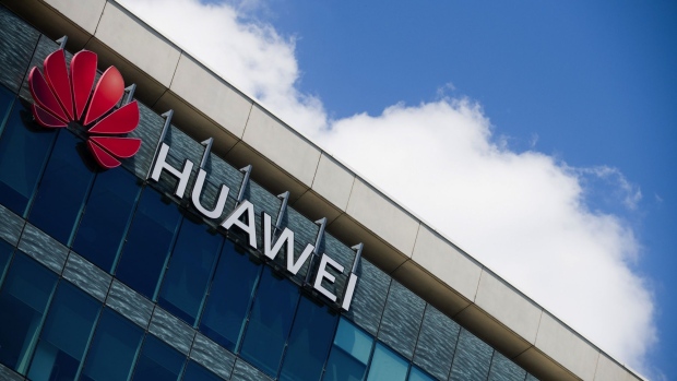 A logo sits on the exterior of the Huawei Technologies France SASU offices in Paris, France, on Tuesday, July 7, 2020. France's decision to give only temporary security approval for 5G mobile equipment shows the government intends to gradually sideline Huawei Technologies Co., a majority party lawmaker said. Photographer: Nathan Laine/Bloomberg