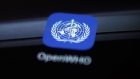 The logo for the World Health Organization (WHO) OpenWHO application is displayed on a smartphone screen in an arranged photograph taken in Bern, Switzerland, on Tuesday, March 31, 2020. The Covid-19 pandemic has triggered a seismic wave of health awareness and anxiety, which is energizing a new category of virus-fighting tech and apps.