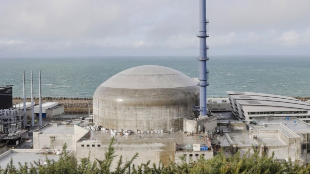 The domed containment building of Flamanville-3 reactor stands as construction work continues on the Evolutionary Power Reactor (EPR) nuclear power plant, operated by Electricite de France SA (EDF), as it sits on the English Channel shoreline in Flamanville, France, on Wednesday, Nov. 16, 2016. EDF said it will start talks on reducing its stake in Areva SA's New NP reactor division after announcing a binding agreement to take control of the 2.5 billion-euro ($2.7 billion) business.