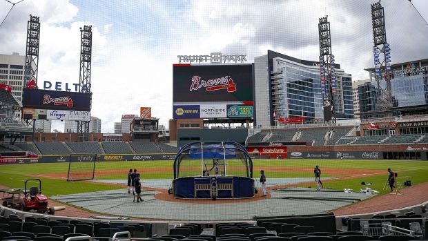 Members of the Atlanta Braves take batting practice during the summer workouts at Truist Park in Atlanta on July 8, 2020.