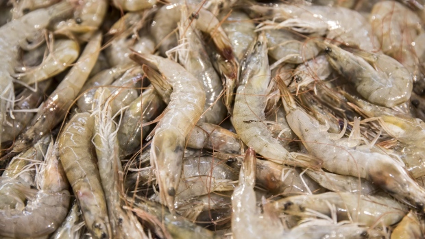 Shrimp are displayed for sale inside a Vanguard hypermarket, operated by China Resources Enterprise Ltd., in Shanghai, China, on Tuesday, Aug. 7, 2018. With trade tensions between the U.S. and China seeming to worsen by the day, mainland companies selling everything from handbags to fresh food are boosting their attempts to cultivate local demand. Photographer: Qilai Shen/Bloomberg