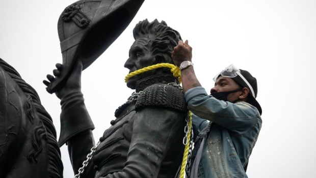WASHINGTON, DC - JUNE 22: Protesters attempt to pull down the statue of Andrew Jackson in Lafayette Square near the White House on June 22, 2020 in Washington, DC. Protests continue around the country over the deaths of African Americans while in police custody. (Photo by Tasos Katopodis/Getty Images)