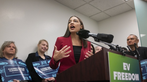 Representative Alexandria Ocasio-Cortez, a Democrat from New York, speaks during a news conference to introduce the EV Freedom Act at the U.S. Capitol in Washington, D.C., U.S., on Thursday, Feb. 6, 2020. The Democratic congresswoman who pushed the Green New Deal to prominence aims to build a national network of high-speed chargers for electric cars under legislation unveiled on Thursday. Tesla Inc. shares surged. Photographer: Alex Edelman/Bloomberg