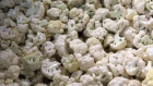 Pieces of washed cauliflower sit prior to packaging at a warehouse of Bigbasket, an e-grocer operated by Supermarket Grocery Supplies Pvt, in Bengaluru, India, on Monday, Feb. 26, 2018. Bangalore-based Bigbasket delivers everyday cooking essentials like ghee (clarified butter), diced coconut and fragrant basmati rice, as well as 18,000 other items from bread to laundry detergent to eight million customers in 25 Indian cities. Photographer: Samyukta Lakshmi/Bloomberg