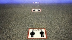 Social distancing signs are displayed on the floor in a building in the financial district of Toronto, Ontario, Canada, on Friday, May 22, 2020. 