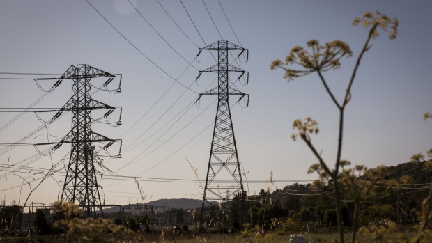 Electrical power polls stand outside of Novato, California, U.S., on Wednesday, Oct. 9, 2019. Half a million homes and businesses in Northern California lost power and more will soon follow as bankrupt California utility giant PG&E Corp. carries out its biggest-ever intentional blackout to keep power lines from sparking blazes. Photographer: David Paul Morris/Bloomberg