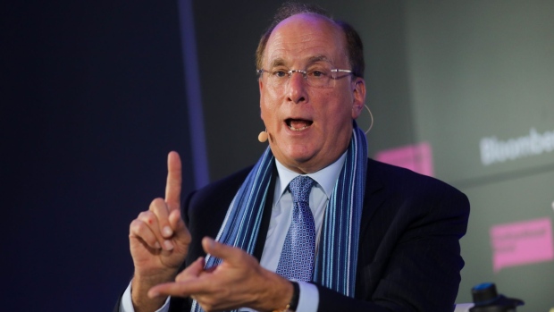 Larry Fink, chief executive officer of BlackRock Inc., gestures as he speaks during a Bloomberg event on the opening day of the World Economic Forum (WEF) in Davos, Switzerland, on Tuesday, Jan. 21, 2020. World leaders, influential executives, bankers and policy makers attend the 50th annual meeting of the World Economic Forum in Davos from Jan. 21 - 24.