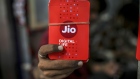 Mobile sim card packets for Jio Platforms Ltd., the mobile network of Reliance Industries Ltd., are displayed for a photograph at a store in Mumbai, India, on Tuesday, July 14, 2020. 