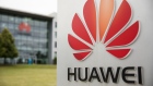 A Huawei Technologies Co. logo sits on a sign outside the company's offices in Reading, U.K., on Monday, July 13, 2020. U.K. Prime Minister Boris Johnson is under pressure to announce a ban on telecoms companies from installing new equipment made by Huawei Technologies Co. in Britain's fifth-generation mobile networks from as soon as the end of 2021.