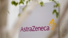 A sign featuring the AstraZeneca Plc logo stands at the company's DaVinci building at the Melbourn Science Park in Cambridge, U.K., on Monday, June 8, 2020. 