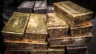 Twenty kilogram gold and silver bricks sit at the ABC Refinery smelter in Sydney, New South Wales, Australia, on Thursday, July 2, 2020. 