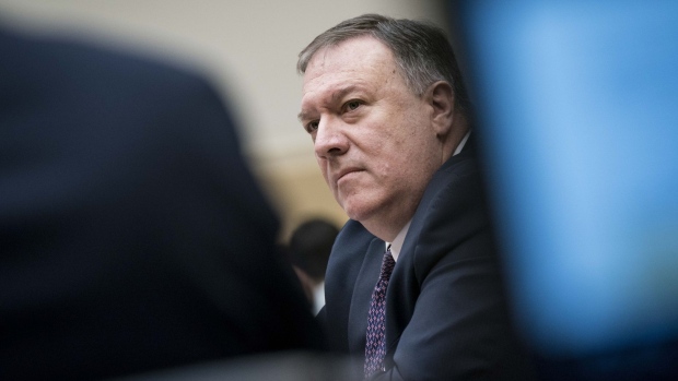 Mike Pompeo, U.S. secretary of state, listens during a House Foreign Affairs Committee hearing in Washington, D.C., U.S., on Friday, Feb. 28, 2020. Pompeo defended the Trump administration's Mideast policy and the targeted killing of Iranian General Qassem Soleimani last month, as the top U.S. diplomat made a rare appearance Friday before House lawmakers. Photographer: Sarah Silbiger/Bloomberg