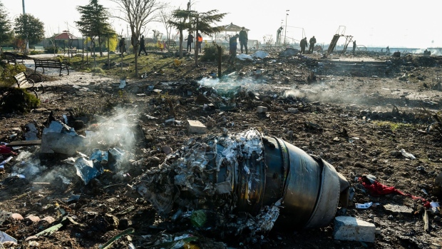 Aircraft parts from the wreckage of a Boeing Co. 737-800 aircraft, operated by Ukraine International Airlines, which crashed shortly after takeoff lie on the ground near Shahedshahr, Iran, on Wednesday, Jan. 8, 2020. The passenger jet, Flight 752, bound for Ukraine crashed shortly after takeoff in Iran, killing everyone on board.