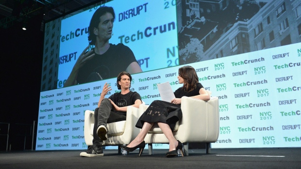 Adam Neumann speaks onstage during TechCrunch Disrupt in New York in 2017. 