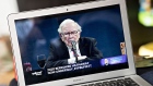 Warren Buffett, chairman and chief executive officer of Berkshire Hathaway Inc., speaks during the virtual Berkshire Hathaway annual shareholders meeting seen on a laptop computer in Arlington, Virginia, U.S., on Saturday, May 2, 2020. Buffett, hosting the annual meeting virtually, has largely stayed in the shadows as the coronavirus pandemic hammered the global economy and stock markets.