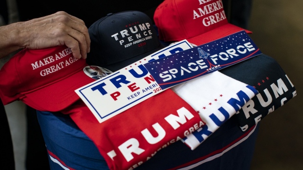 Campaign merchandise is displayed for sale before a rally with U.S. President Donald Trump in Charlotte, North Carolina, on Monday, March 2, 2020.